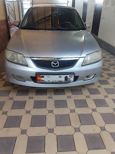 Mazda 323: 2001 г., 1.6 л, Механика, Бензин, Хэтчбэк