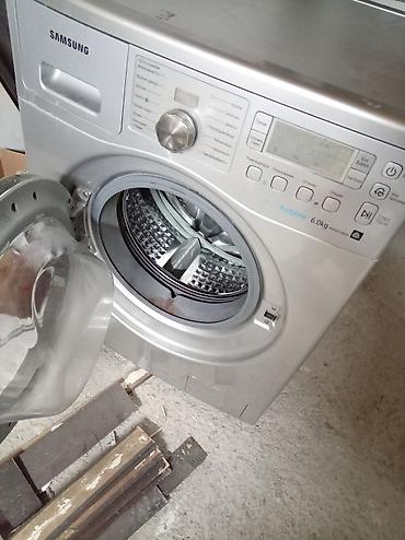 Paltaryuyan maşınlar: Samsung paltaryuyan maşın – ön yükləməli, gümüşü korpus. Catdirma var — 2