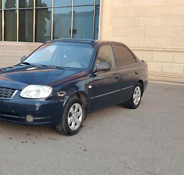 disk masin: Hyundai Accent sedan - Kuzov: 4 qapılı sedan, tünd mavi rəng - — 2