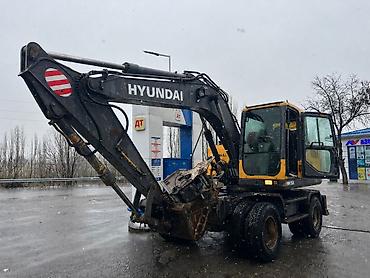 хайнань туры: Фронтальный погрузчик XCMG LW500KV + колесный экскаватор Hyundai HW150 — 3