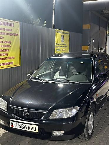 Mazda: Mazda 323: 2001 г., 1.6 л, Механика, Бензин, Седан — 2