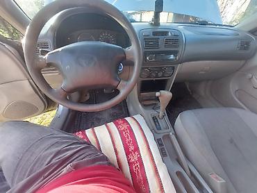 Toyota: Toyota Corolla: 1.8 l | 2000 il Sedan — 11