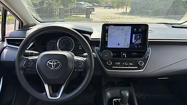 byd e2: Toyota Corolla: 2019 г., 1.8 л, Вариатор, Гибрид, Седан — 6
