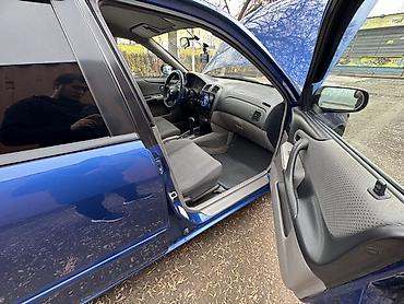 Mazda: Mazda 323: 2000 г., Хэтчбэк — 4