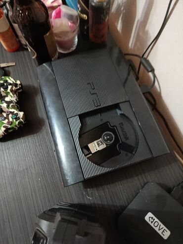 PS3 (Sony PlayStation 3): Sony PlayStation 3 Super Slim konzola (top‑loader) sa kamuflažnim — 4