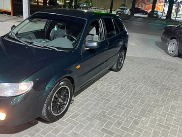 Mazda: Mazda 323: 1999 г., 1.6 л, Механика, Газ, Хэтчбэк