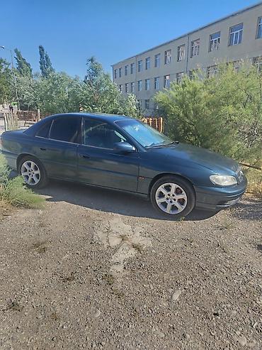 фольксваген поло л с: Opel Omega B sedan - Kuzov: 4 qapılı sedan, tünd yaşıl rəng - — 4