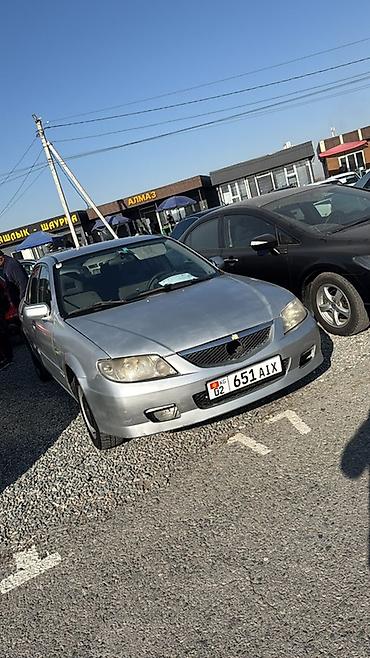 forester 2004: Mazda 323: 2003 г., 1.3 л, Механика, Бензин, Седан — 1