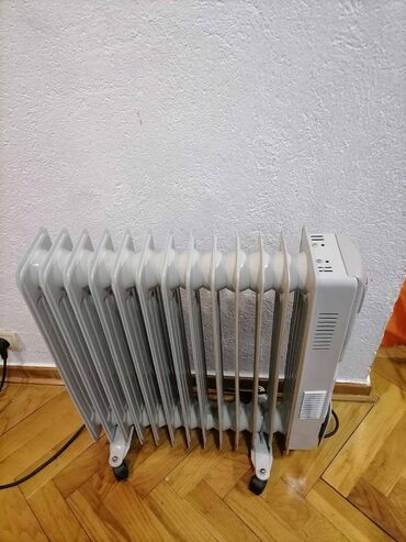 pec na pelet za 150 kvadrata: Radijator uljani ELIT+ na točkiće od 13 rebara. 2500 w Dobar