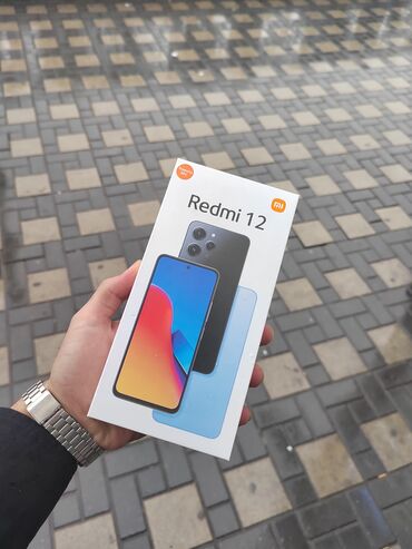 телефон флай нимбус 7: Xiaomi Redmi 12, 128 ГБ, цвет - Голубой, 
 Кнопочный, Отпечаток пальца