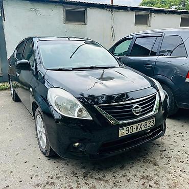 2012 07: Nissan Sunny: 1.5 l | 2012 il Sedan — 2