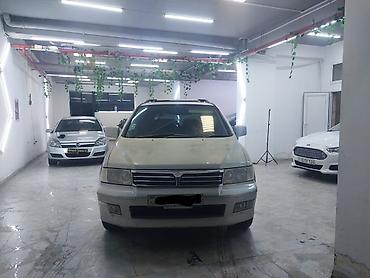 mitsubishi lancer evolution: Mitsubishi Chariot Grandis – 7 yerlik geniş ailə miniveni — 2