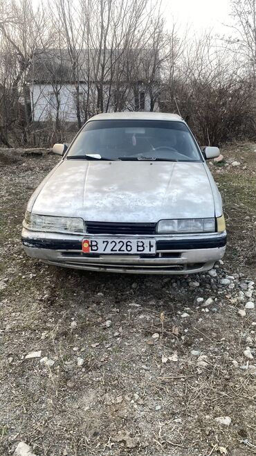 электрический автомобиль: Mazda 626: 1989 г., 2 л, Механика, Бензин, Седан