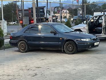 щуп демио: Mazda 626: 1997 г., 1.8 л, Механика, Бензин, Седан — 3