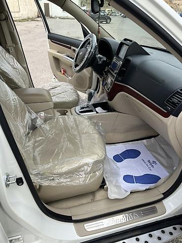 kia rio sukan: Hyundai Santa Fe: 2 l | 2009 il Krossover — 5