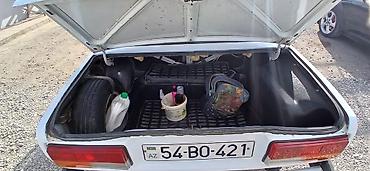 VAZ (LADA): VAZ 2107 sedan Xüsusiyyətlər: - Kuzov: 4 qapılı sedan, ağ rəng - — 6