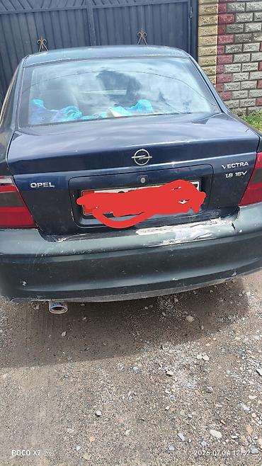 крыло мерс 210: Opel Vectra, седан. Задняя часть автомобиля: крышка багажника с — 1