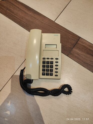 islenmis telefon aliram: Stasionar telefon Simli, İşlənmiş, Ünvandan götürmə