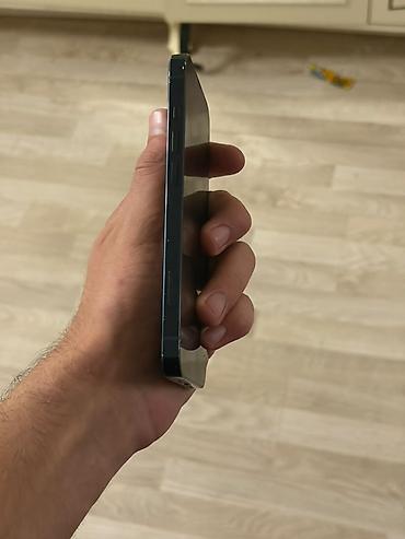 sim: IPhone 14, 128 GB, Qara, Face ID — 8