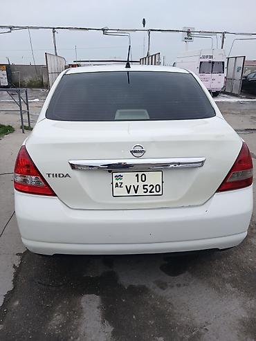 4 ayaq: Nissan Tiida: 1.6 l | 2006 il Sedan — 1