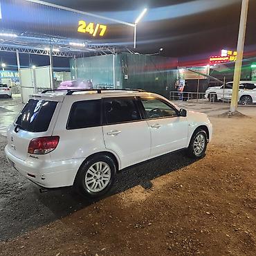 митсубиси аиртек: Mitsubishi Airtrek: 2002 г., 2 л, Автомат, Бензин, Универсал — 1