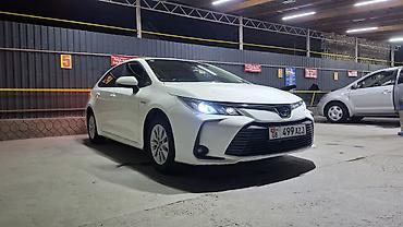 Toyota: Toyota Corolla: 2022 г., 1.8 л, Вариатор, Гибрид, Седан — 1