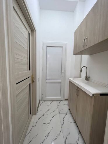 Digər kommersiya daşınmaz əmlakı: Qara Çuxur qəsəbəsində yerləşən yeni tikili 5 mərtəbəli binanın 1-ci — 11