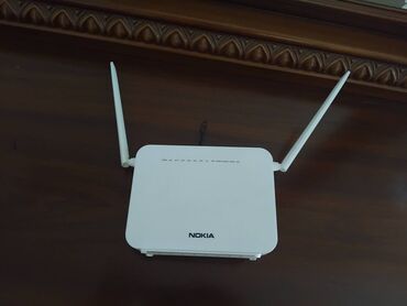 modem optik: Nokia madem 1 ay istifade edilib
