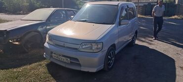 афто рынок каракол: Компактный автомобиль Nissan Cube в серебристом цвете, идеально