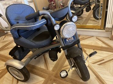 Xodunoklar: Uşaq üçtəkərli velosipedi – push-handleli model (tutacaq). Demək olar