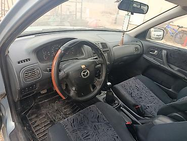 Продажа авто: Mazda 323: 1999 г., 1.6 л, Механика, Бензин, Универсал — 4