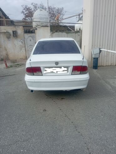 фольксваген поло автомат: İran Khodro Samand – ağ rəngli sedan Texniki və komfort