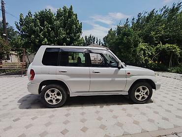 7 nəfərlik avtomobillər: Mitsubishi Pajero: 1.8 l | 1998 il 350000 km Ofrouder/SUV — 3