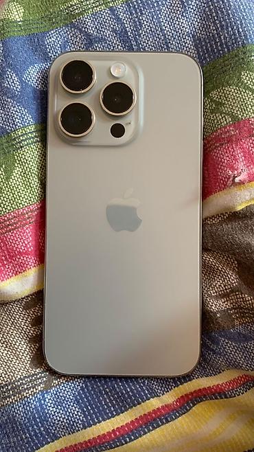 IPhone 15 Pro, Б/у, 128 ГБ, Natural Titanium, Чехол, 92 %