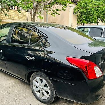2012 07: Nissan Sunny: 1.5 l | 2012 il Sedan — 5