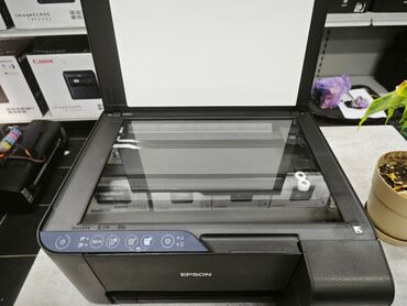 скупка нерабочих планшетов: Многофункциональное устройство Epson EcoTank L3250 в черном корпусе
