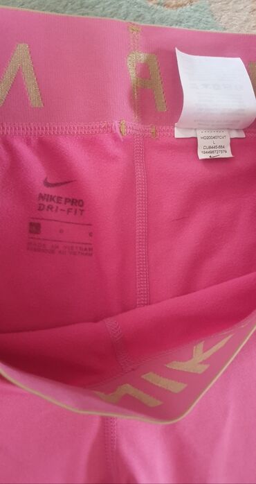 Helanke, biciklistički šortsevi: NIKE pro dri fit original helanke roze boje sa zlatnom debelom gumom — 2