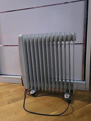 istilik elanı: Yağ ilə işləyən elektrik radiatoru 12 bölməli, Yaponiya istehsalı — 1