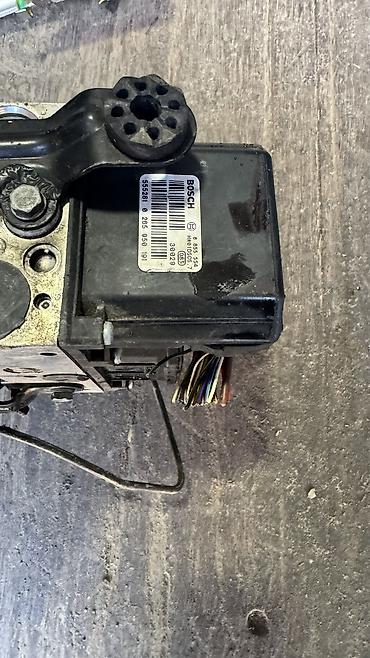 Панели, обшивки: BMW X5 (E53), авто запчасти Салонные детали ходовой частьАбс блоки — 4