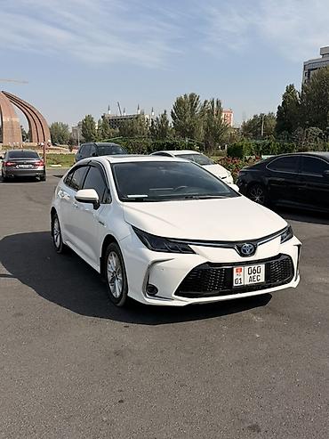 Toyota Corolla: 2022 г., 1.6 л, Автомат, Гибрид, Седан