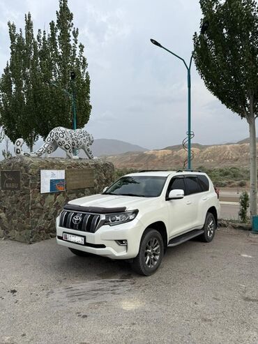 обменяю на машину: Белый внедорожник Toyota Land Cruiser Prado. Автомобиль оснащен