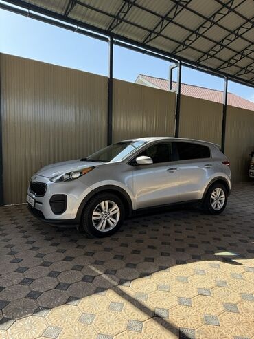 киа кроссоверы: Kia Sportage серебристого цвета Объём двигателя 2.4 бензин Пробег 