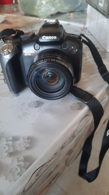 Фотоаппараты: Canon PowerShot SX10 IS fotoaparat - 20x optik zoomlu Canon Zoom Lens
