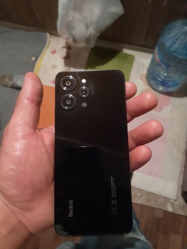 ən ucuz telfonlar: Xiaomi Redmi Note 12, 256 ГБ, цвет - Черный, 
 Гарантия, Кнопочный, Сенсорный