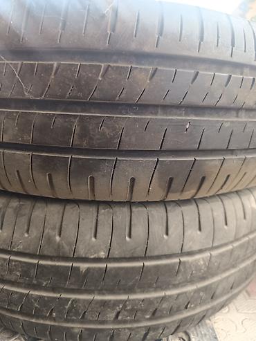 range over: Летние шины Dunlop ENASAVE EC204 - Размер: 205/65 R15 - Индекс — 1