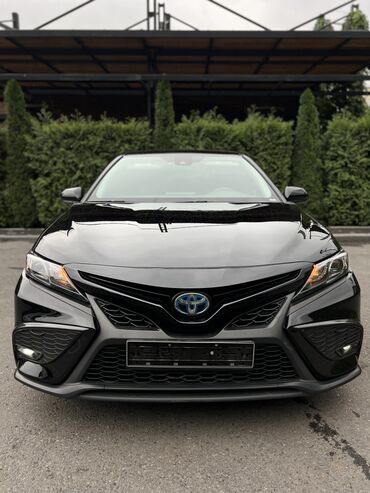 электро мотсикл: Toyota Camry: 2021 г., 2.5 л, Гибрид, Седан