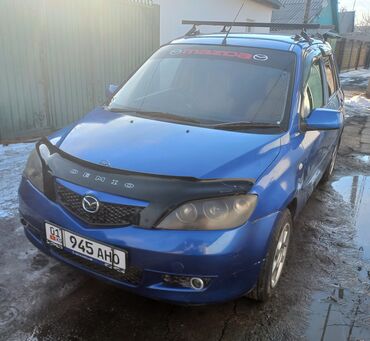 телефон меняю: Mazda Demio: 1.3 л | 2003 г. | Универсал | Хорошее