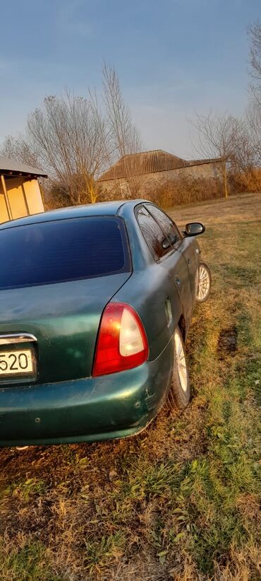Daewoo: Model: Daewoo Nubira (sedan) Rəng: Tünd yaşıl Yanacaq növü: Benzin — 6