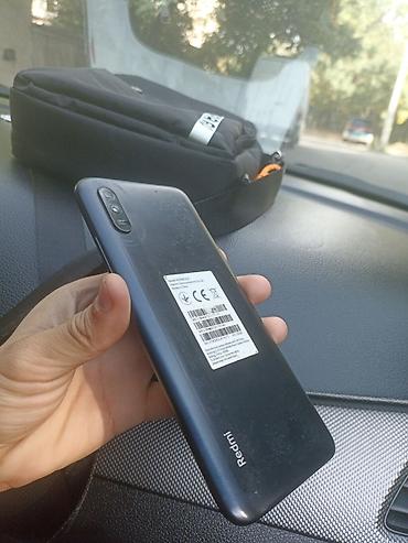 Уюлдук телефондор жана аксессуарлар: Redmi, Redmi 9A, Колдонулган, 32 ГБ, түсү - Кара, 2 SIM — 1
