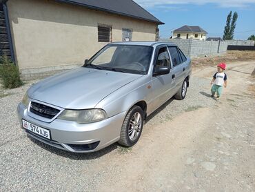 диск на нексию: Серебристый седан Daewoo Nexia с характерным дизайном кузова